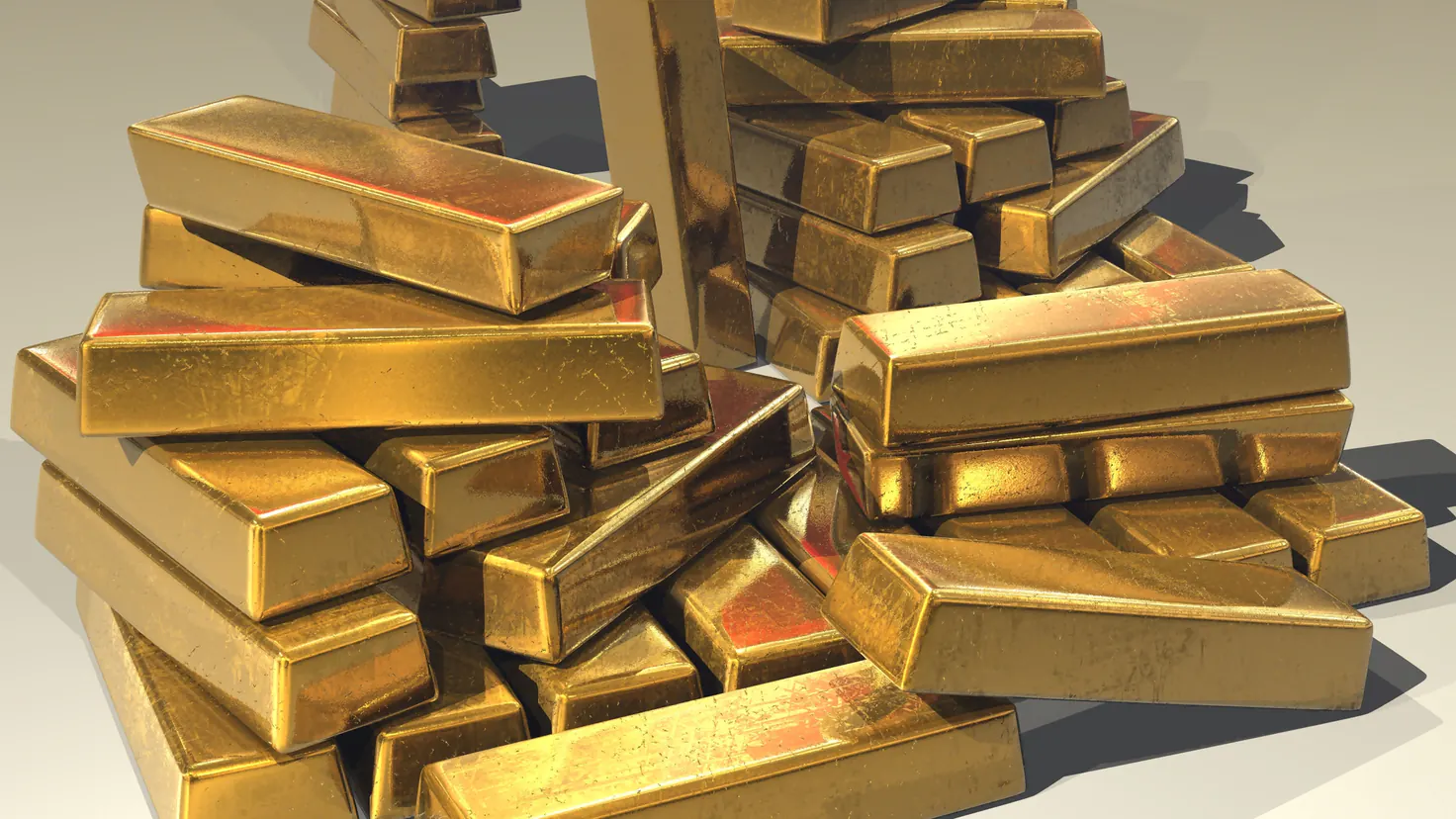 Lingots d’or d’investissement empilés, décision d’acheter de l’or en 2026 comme assurance contre la dévaluation monétaire