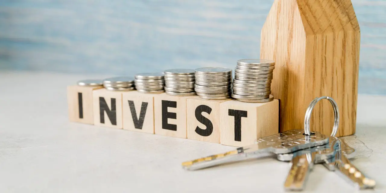 Investit-pieces-de-monnaie-avec-maison-en-bois-investir-sans-se-tromper